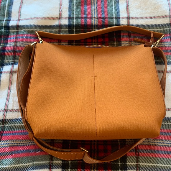 Rothy's Handbags - EUC Rothy’s mini bucket bag in Amber brown